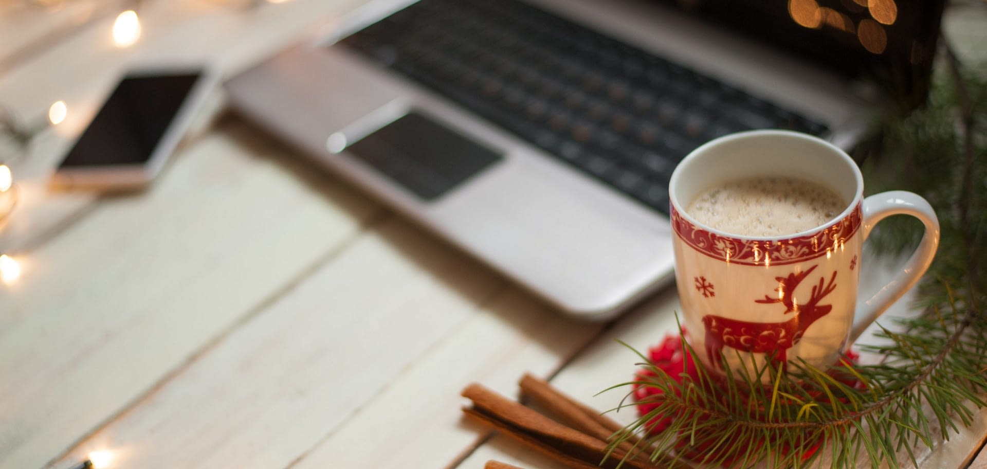 Freelancer's working place at home decorated for Christmas holiday